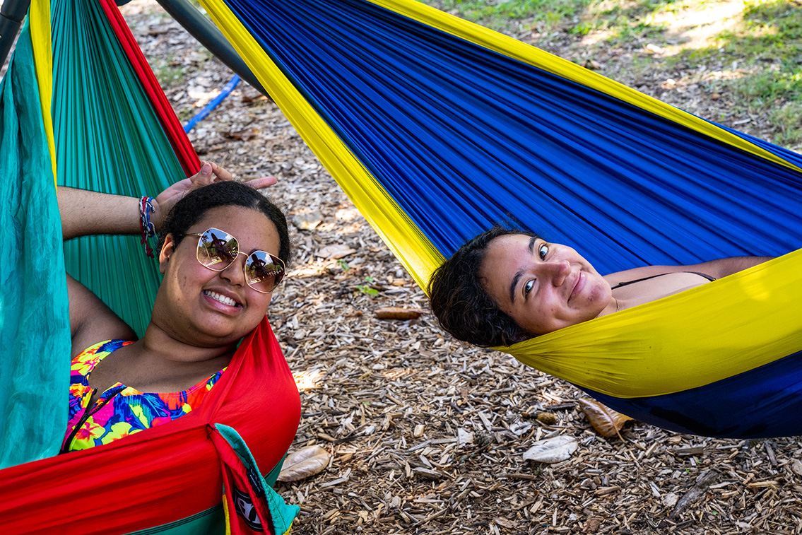 Students relaxing in Hammocks at Piney Lake