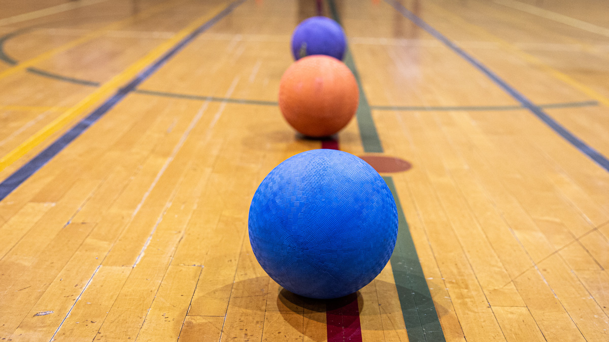 dodgeballs on gym floor